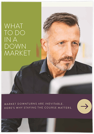 The cover photo of the whitepaper "What to Do in a Down Market." The main photo is a man looking at a computer screen.